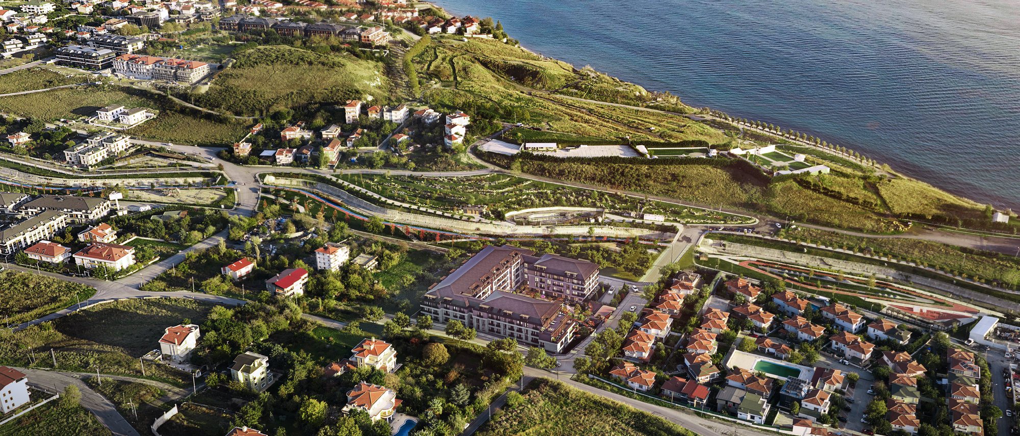 CasaBlu Vadi blocks beside Beylikdüzü Yaşam Vadisi and the Marmara Sea, aerial view