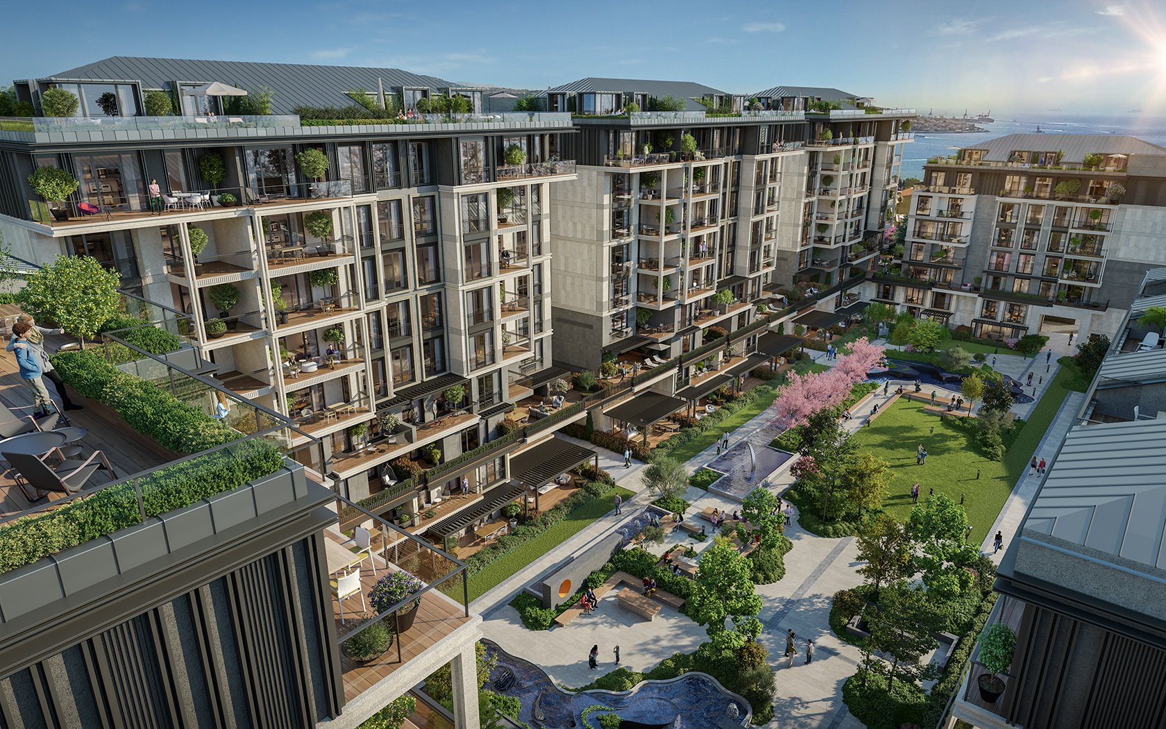 Referans Beşiktaş blocks around a landscaped courtyard in Abbasağa with the Bosphorus beyond