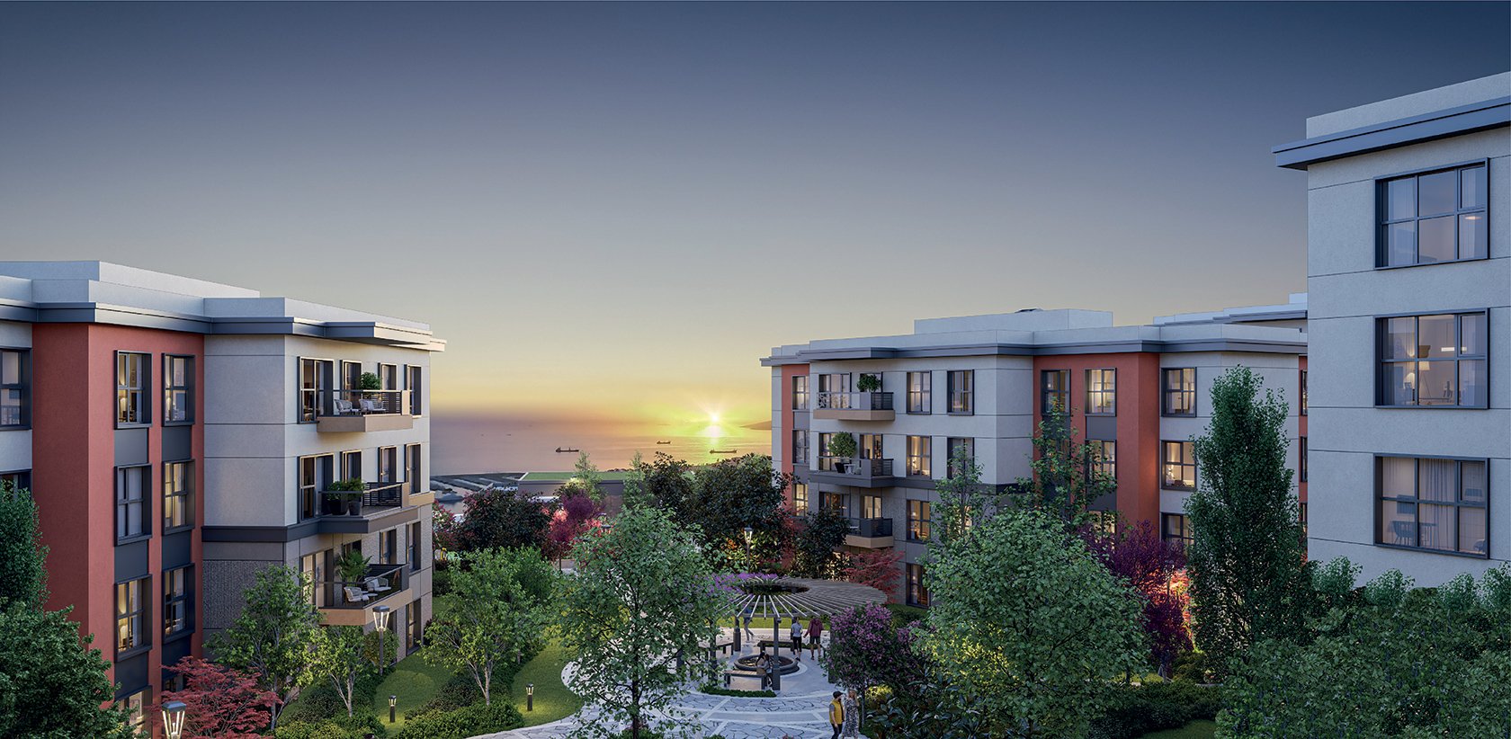 Referans Pendik courtyard between the blocks at sunset with the sea on the horizon